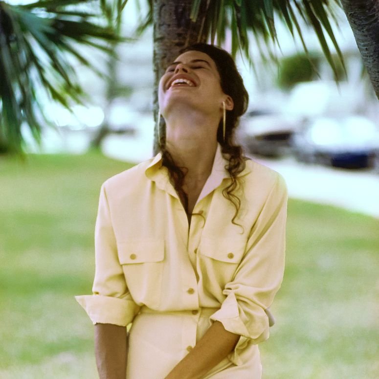 Image may contain: Clothing, Apparel, Grass, Plant, Human, Person, Female, and Shorts